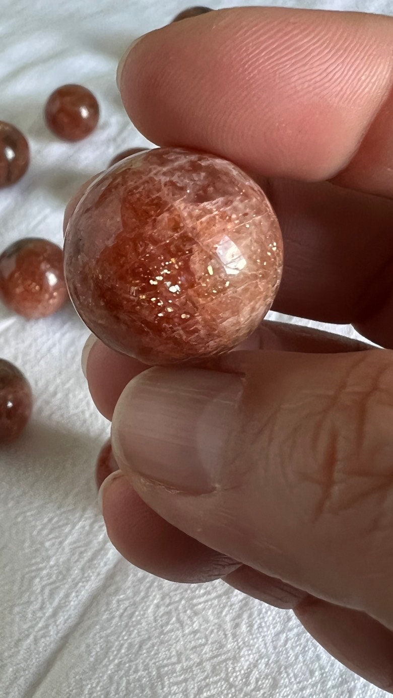 Gorgeous high quality sunstone sphere, one (1) polished crystal ball, approx 10-15 grams per sphere x 0.9 inch around, Intuitively chosen