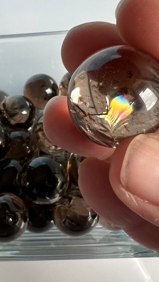 Stunning high-quality all-natural SMOKY QUARTZ spheres from Brazil (randomly chosen) with bright rainbows, One (1) 20-25mm