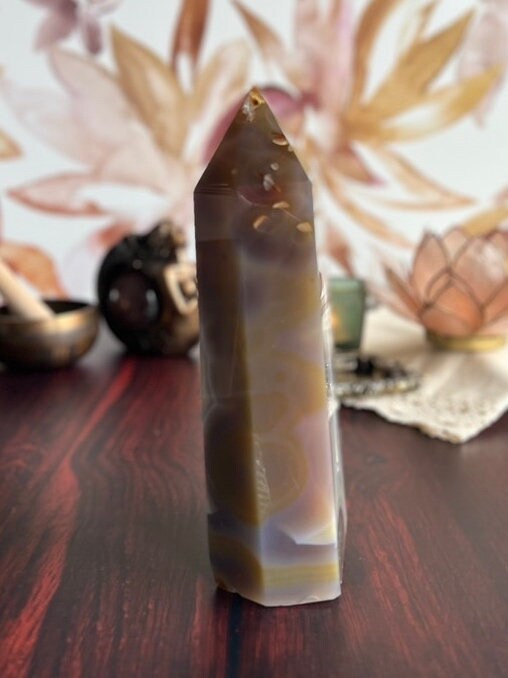 Gorgeous Agate Tower, with swirling colors throughout stands 7 1/2 inches and weighs 2.5 pounds (AG-T-1)