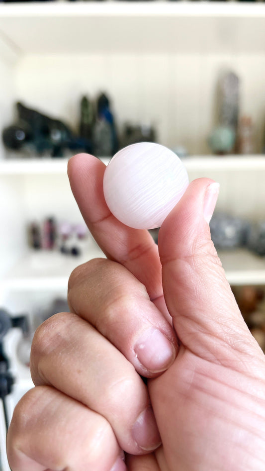 Pink Mangano Calcite Sphere 1 inch with Vibrant glow, UV Reactive Fluorescent
