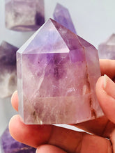 Load image into Gallery viewer, Beautiful 2 1/2 inch Amethyst Point with inclusions weighs 5 oz. Short but stocky tower with interesting subtle pattern
