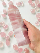 Load image into Gallery viewer, Stunning High quality Rose Quartz Tower stands 7 1/2 inches tall and weighs about 1.9 pounds, Beautiful Pink throughout
