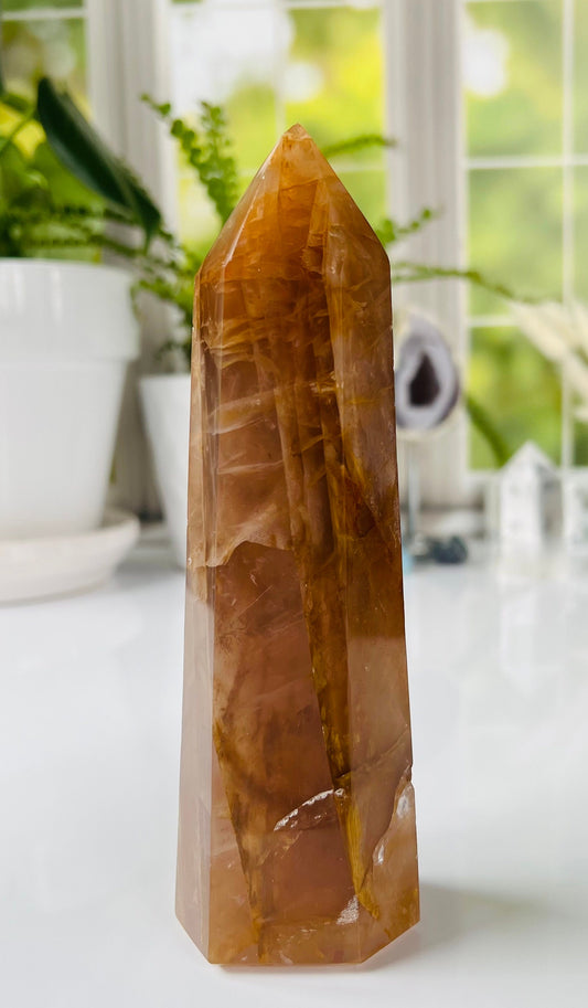 Golden Healer Quartz Tower, 6 1/2 inches tall, also known as Yellow Hematoid Quartz, Polished rich colored tower with rainbows crystal