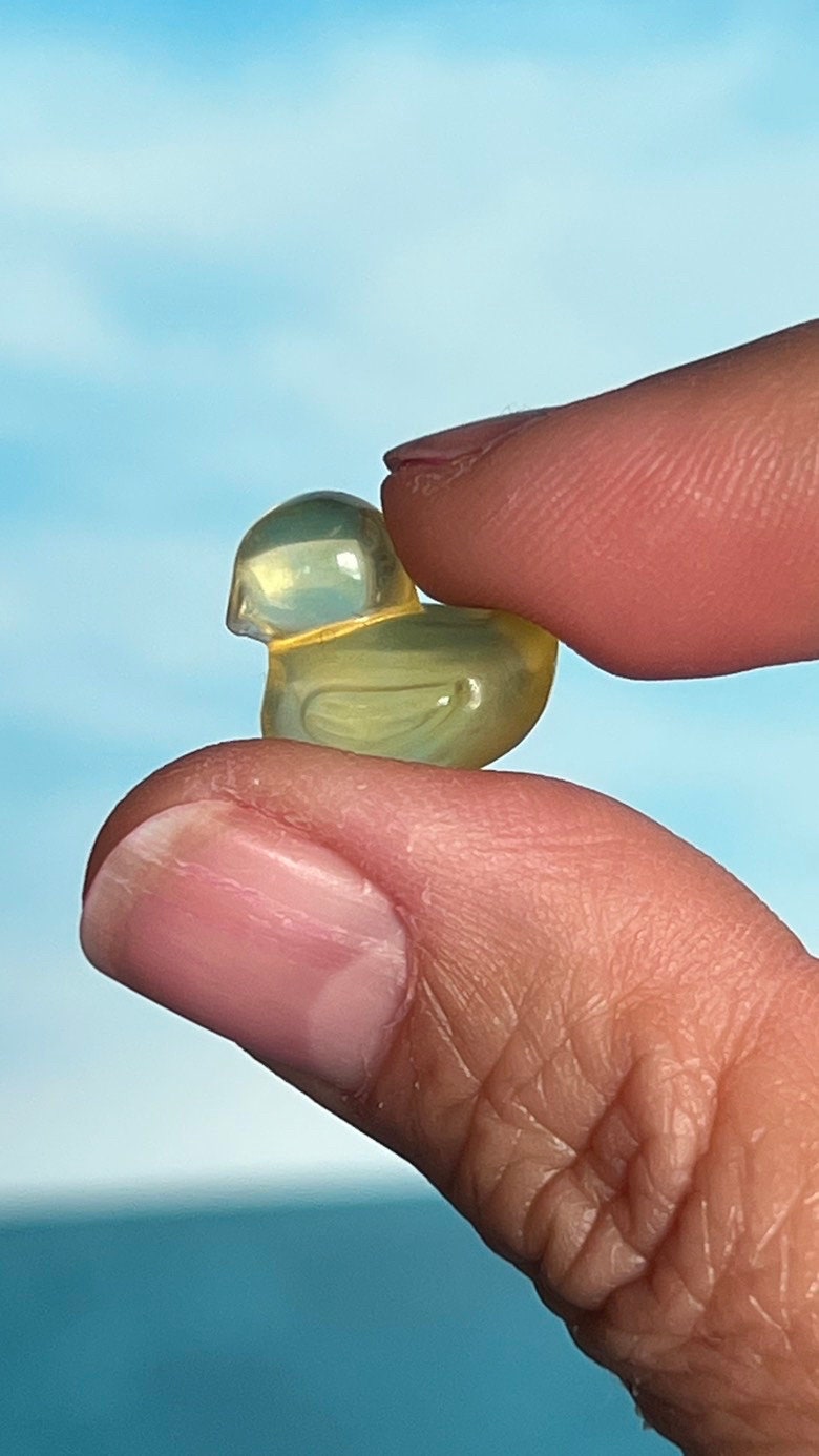 fluorite ducky mini carving, 1/2 inch crystal carving, hand carved crystals, Teeny tiny crystal carving, no, seriously, it's small