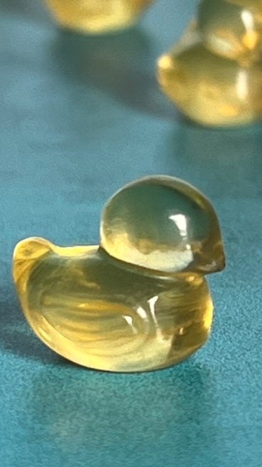 fluorite ducky mini carving, 1/2 inch crystal carving, hand carved crystals, Teeny tiny crystal carving, no, seriously, it's small