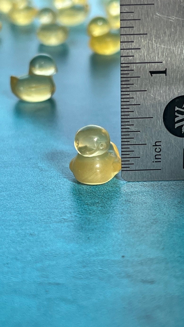 fluorite ducky mini carving, 1/2 inch crystal carving, hand carved crystals, Teeny tiny crystal carving, no, seriously, it's small