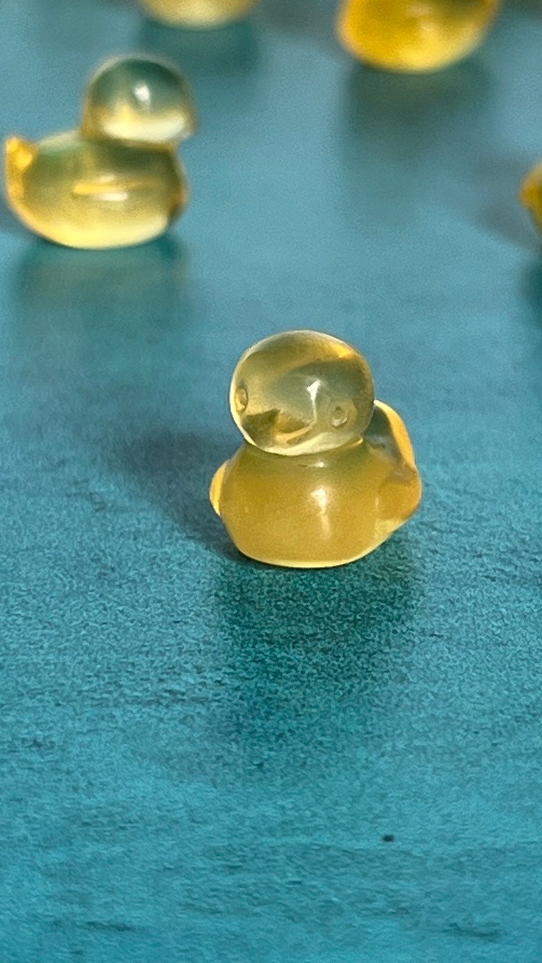 fluorite ducky mini carving, 1/2 inch crystal carving, hand carved crystals, Teeny tiny crystal carving, no, seriously, it's small