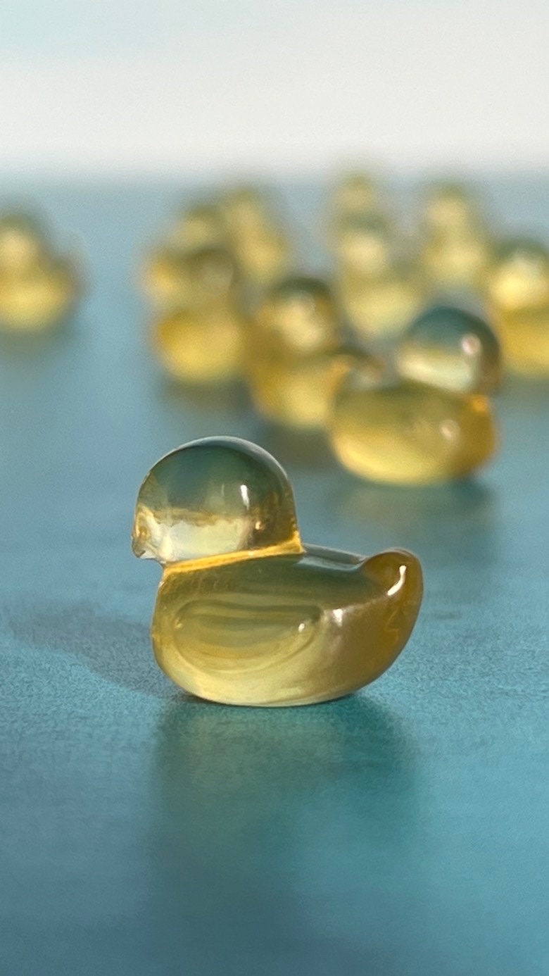 fluorite ducky mini carving, 1/2 inch crystal carving, hand carved crystals, Teeny tiny crystal carving, no, seriously, it's small
