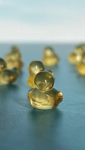 Load image into Gallery viewer, fluorite ducky mini carving, 1/2 inch crystal carving, hand carved crystals, Teeny tiny crystal carving, no, seriously, it&#39;s small
