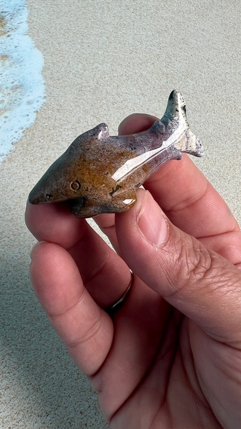 Super cute Ocean Jasper mini shark carvings in pastel colors approximately 2 inches. Random pull. Hand carved. high shine baby crystal shark