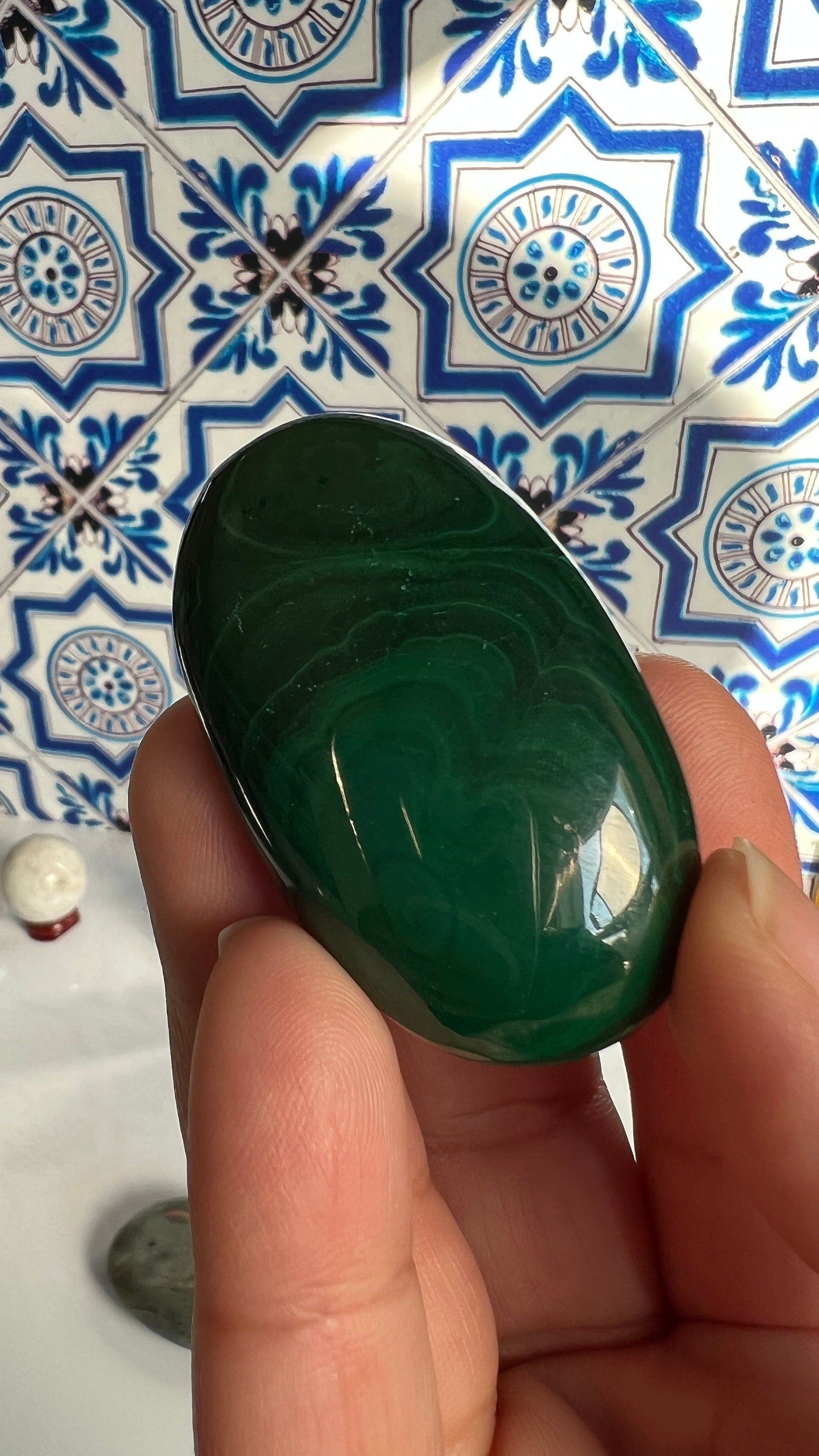 Authentic Malachite Palm Stones with wonderful patterns, High Quality and shine surface. No obvious blemishes. 2 inches 2.2 ounces