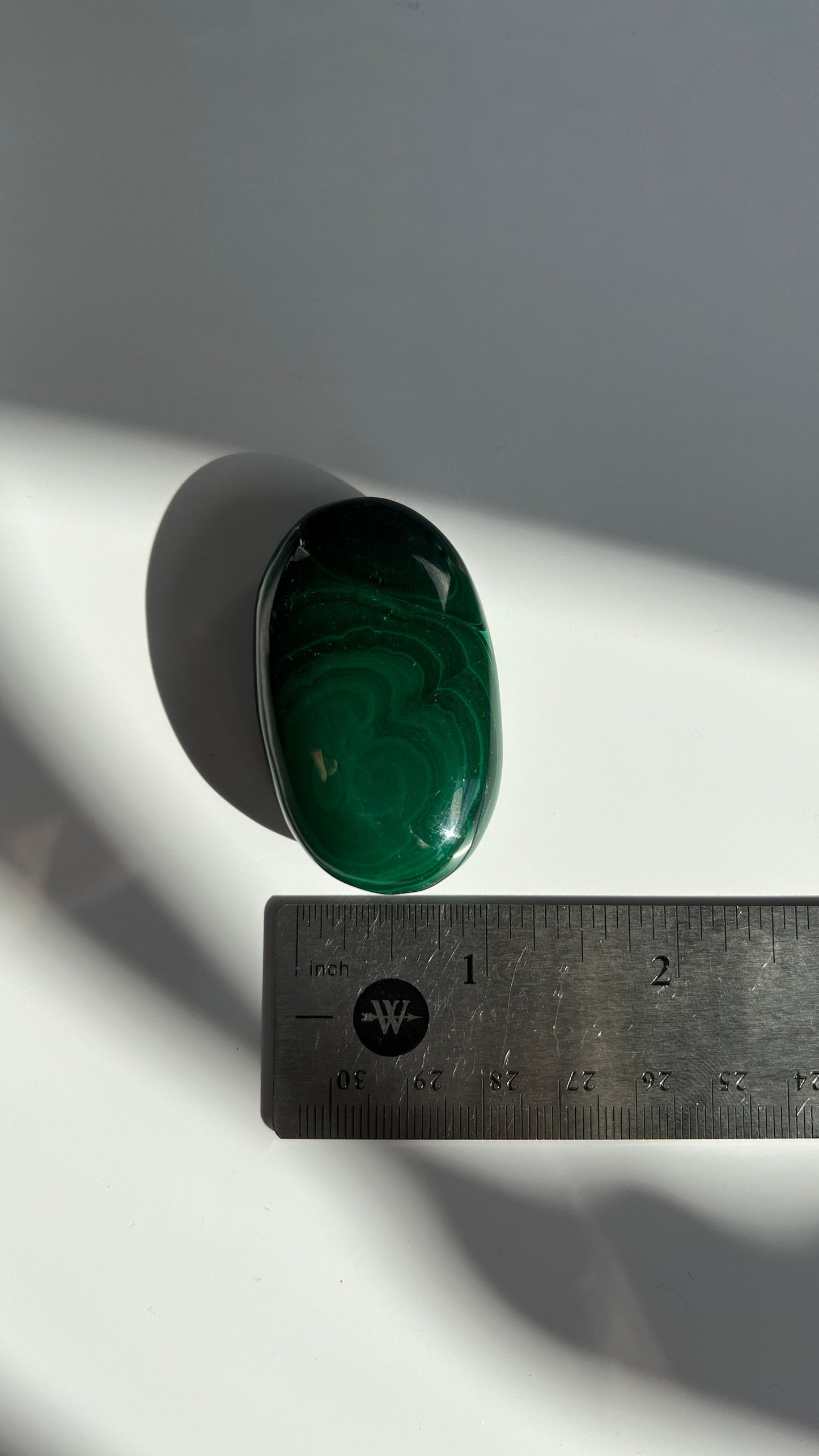 Authentic Malachite Palm Stones with wonderful patterns, High Quality and shine surface. No obvious blemishes. 2 inches 2.2 ounces