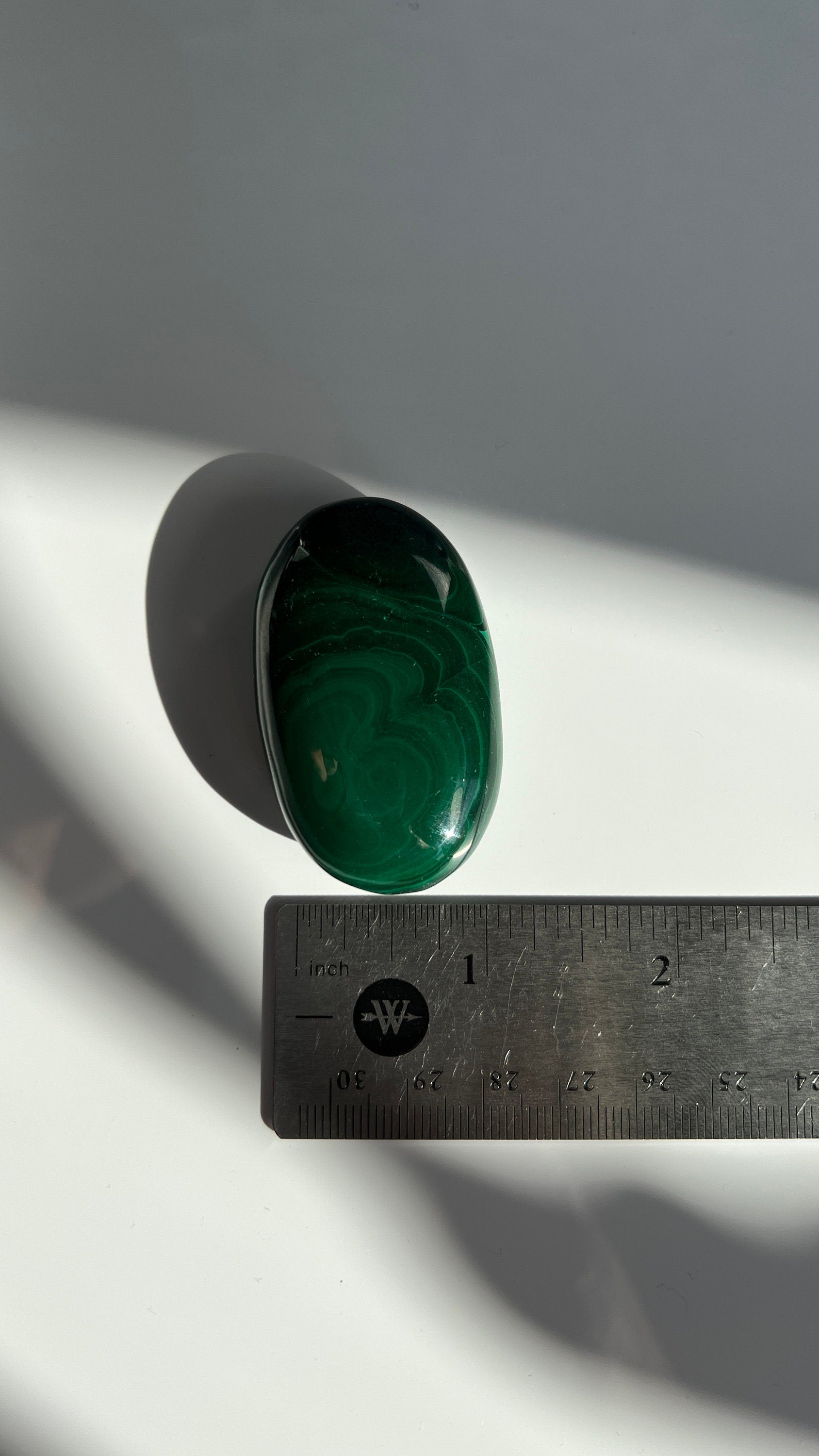 Authentic Malachite Palm Stones with wonderful patterns, High Quality and shine surface. No obvious blemishes. 2 inches 2.2 ounces