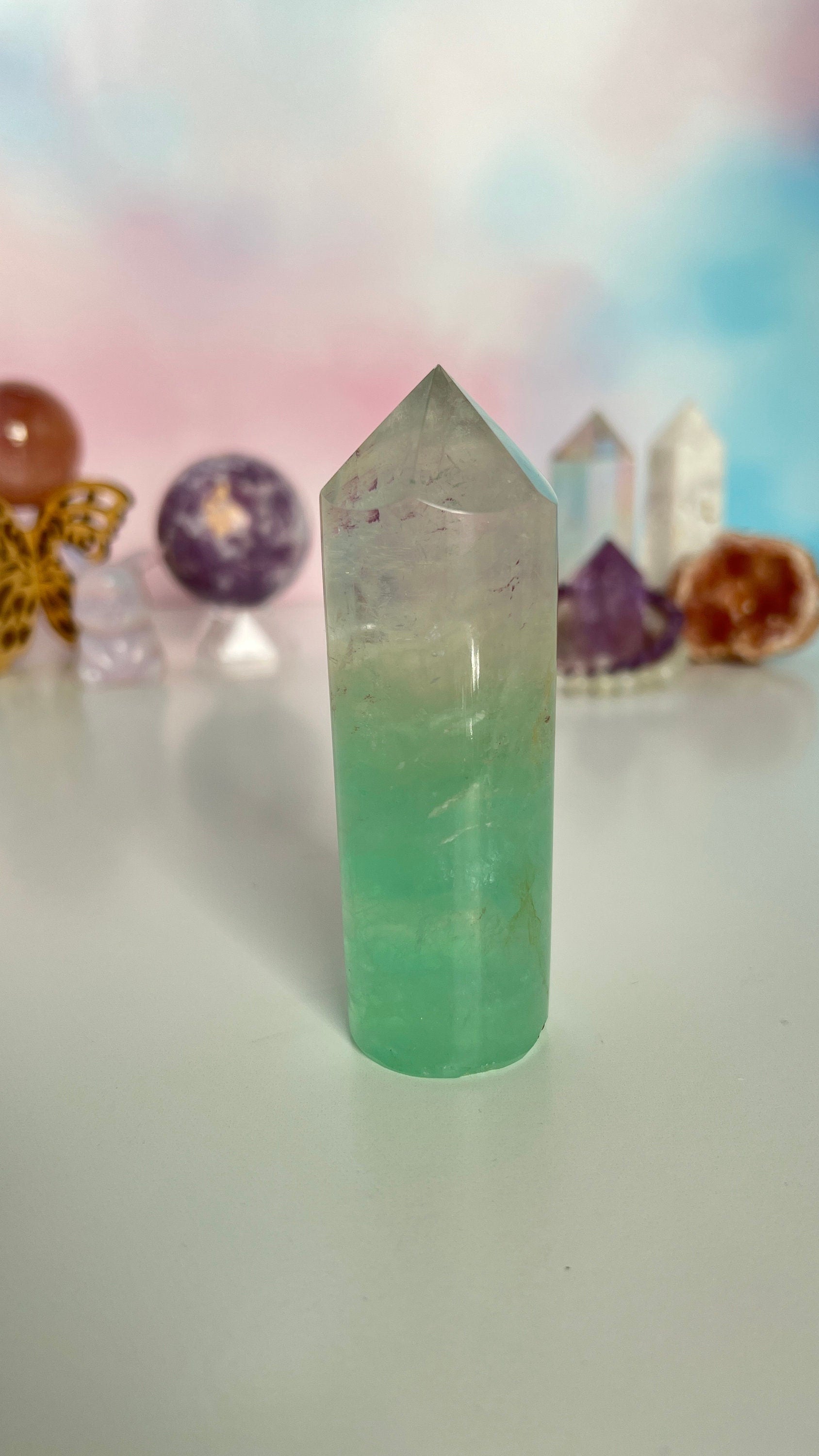 Stunning Fluorite Cylindrical base tower with wonderful clarity and gorgeous green color. Rainbow inclusion on top. (FCT-60)