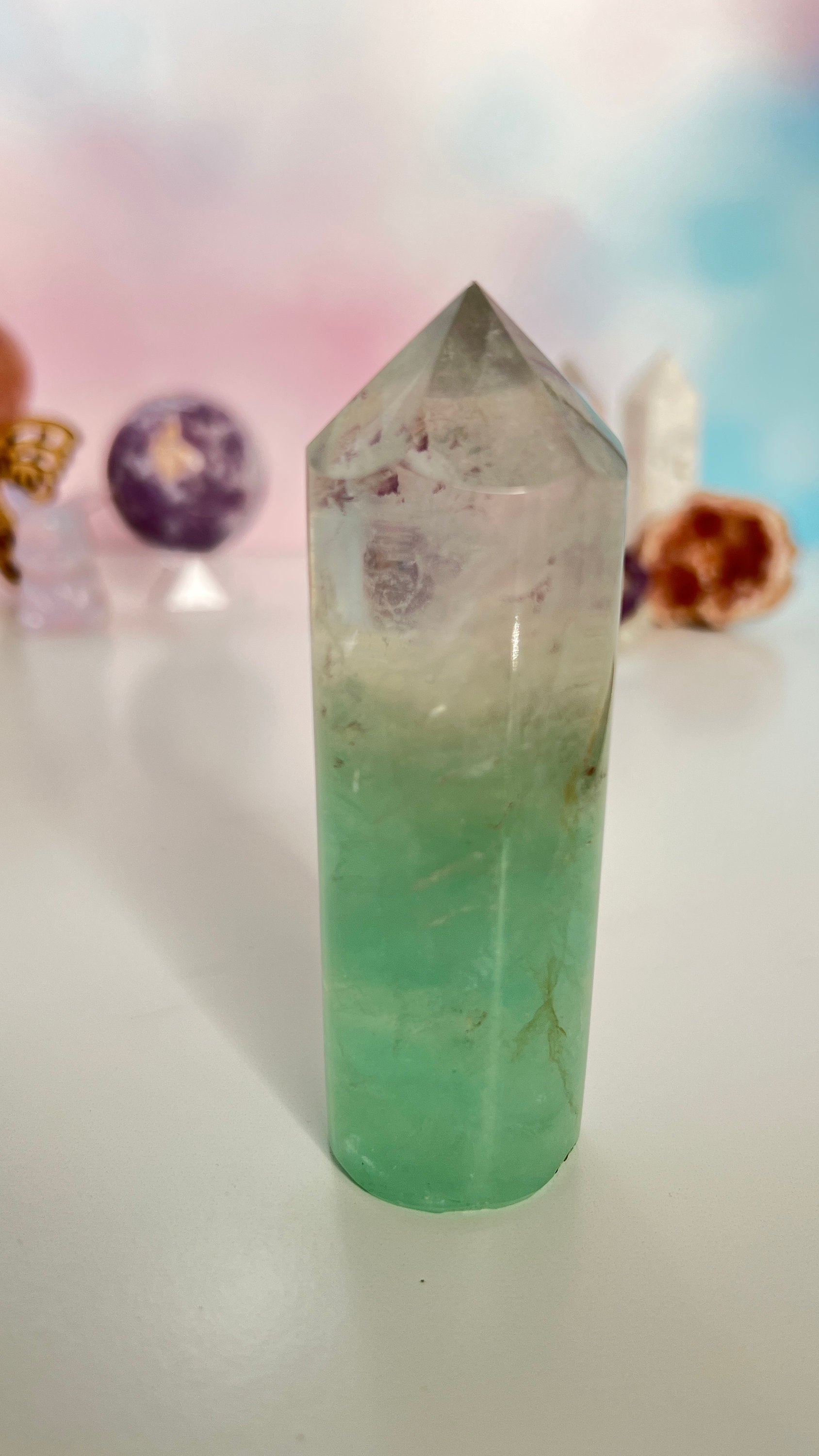 Stunning Fluorite Cylindrical base tower with wonderful clarity and gorgeous green color. Rainbow inclusion on top. (FCT-60)