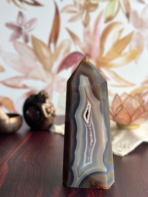 Gorgeous Agate Tower, with swirling colors throughout stands 7 1/2 inches and weighs 2.5 pounds (AG-T-1)