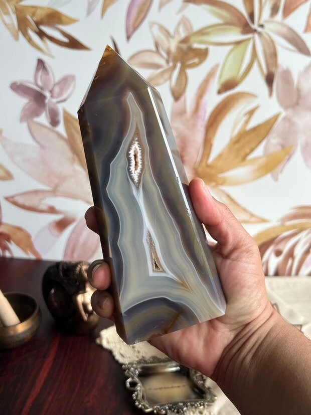 Gorgeous Agate Tower, with swirling colors throughout stands 7 1/2 inches and weighs 2.5 pounds (AG-T-1)