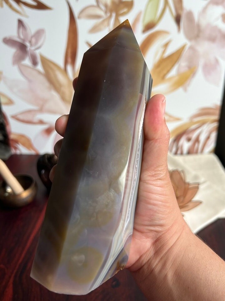 Gorgeous Agate Tower, with swirling colors throughout stands 7 1/2 inches and weighs 2.5 pounds (AG-T-1)