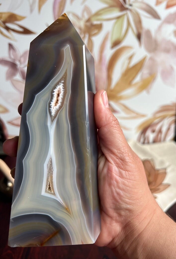 Gorgeous Agate Tower, with swirling colors throughout stands 7 1/2 inches and weighs 2.5 pounds (AG-T-1)