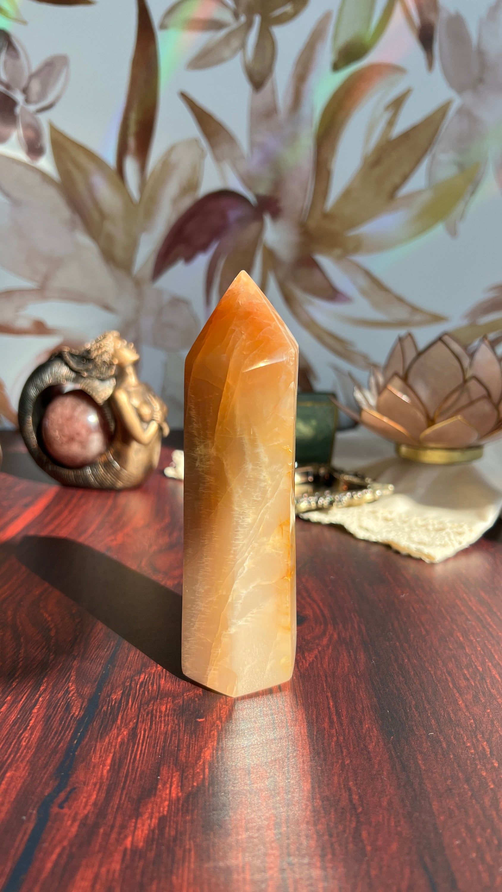 Stunning Peach Moonstone Tower is super flashy on two sides. It stands 5 1/2 inches tall and weighs 12. ounces (PMT-1)