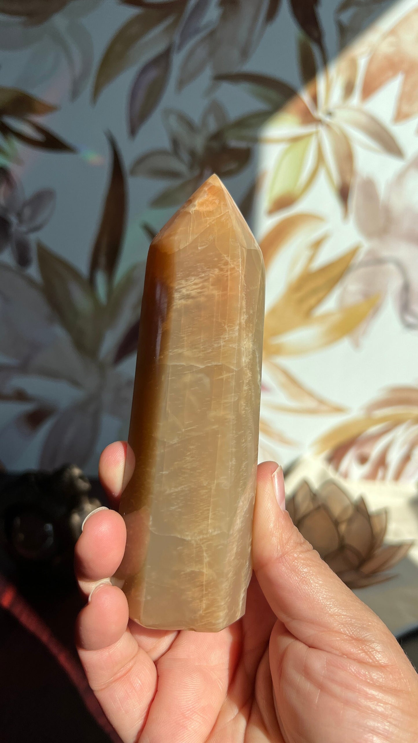 Stunning Peach Moonstone Tower is super flashy on two sides. It stands 5 1/2 inches tall and weighs 12. ounces (PMT-1)