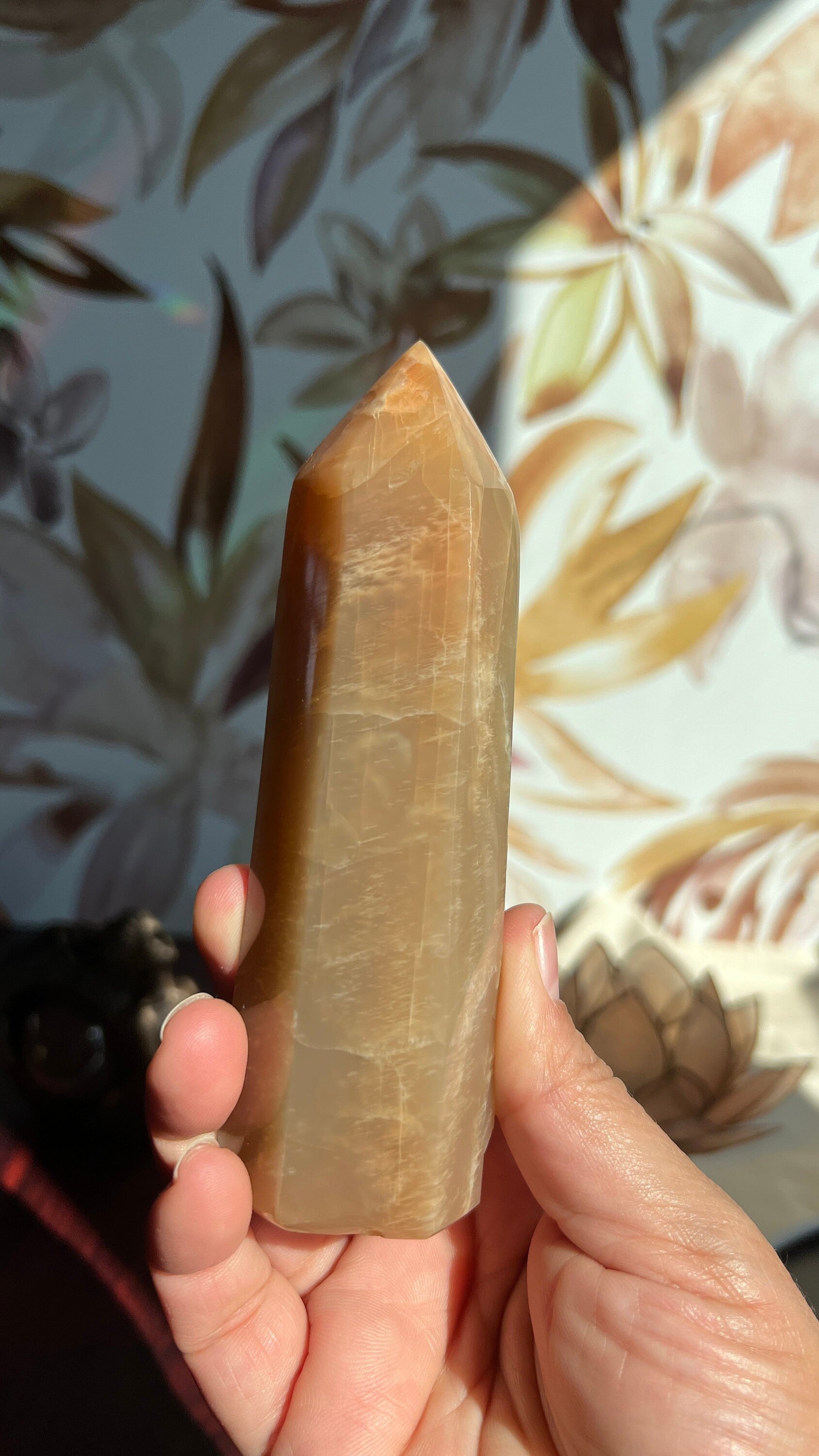 Stunning Peach Moonstone Tower is super flashy on two sides. It stands 5 1/2 inches tall and weighs 12. ounces (PMT-1)