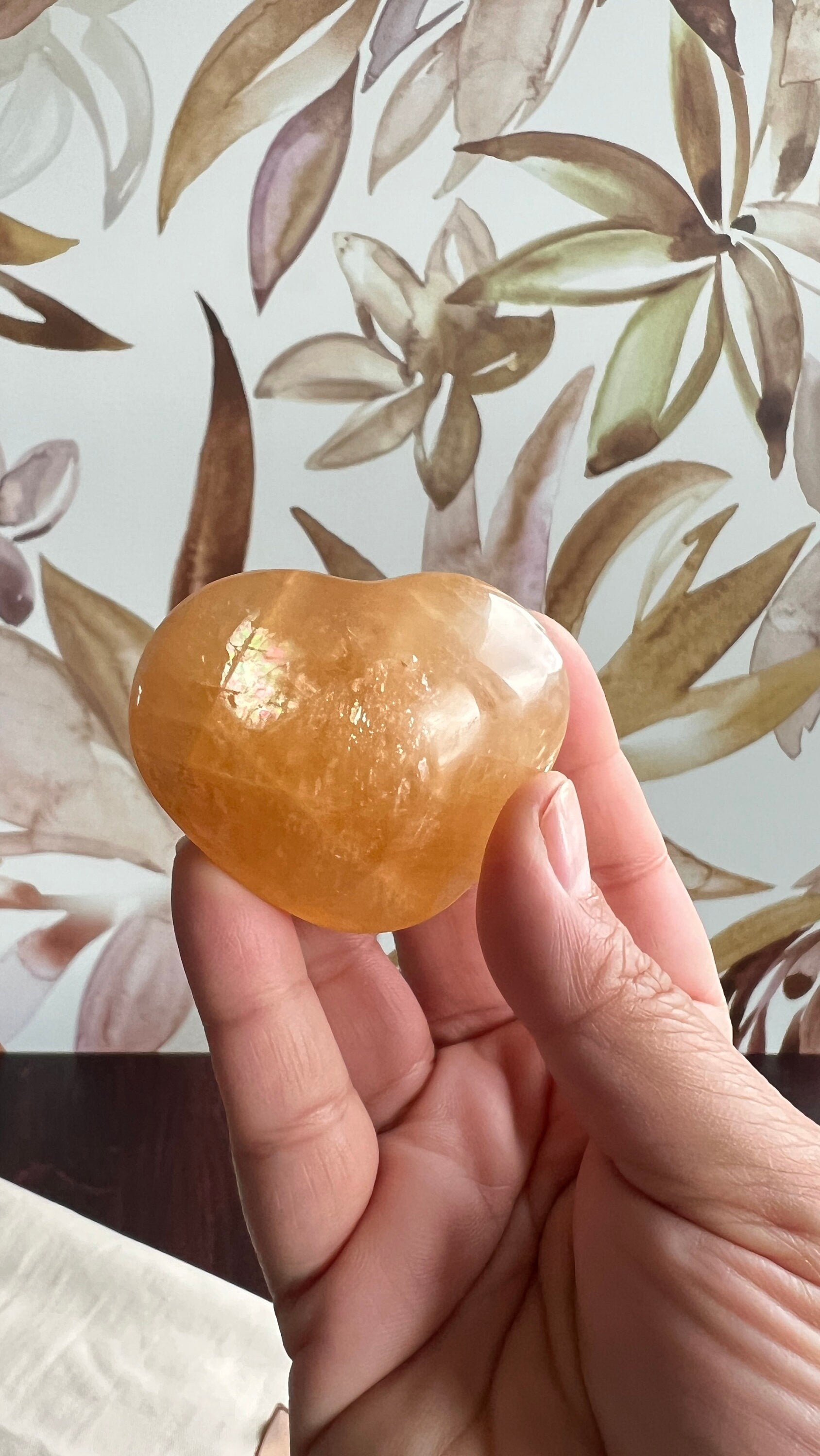 Beautiful Honey Calcite Heart Carving with rainbow inclusions 2 1/2 inches wide 3.5 ounces