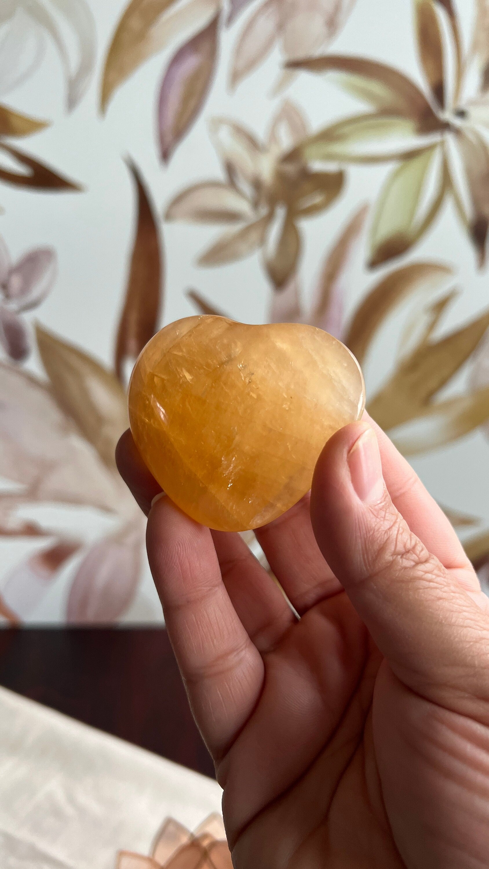 Beautiful Honey Calcite Heart Carving with rainbow inclusions 2 1/2 inches wide 3.5 ounces