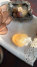 Load image into Gallery viewer, Beautiful Honey Calcite Heart Carving with rainbow inclusions 2 1/4 inches wide 2.8 ounces (HC-Heart2)
