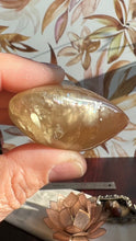Load image into Gallery viewer, Beautiful Honey Calcite Heart Carving with rainbow inclusions 2 1/4 inches wide 2.8 ounces (HC-Heart2)
