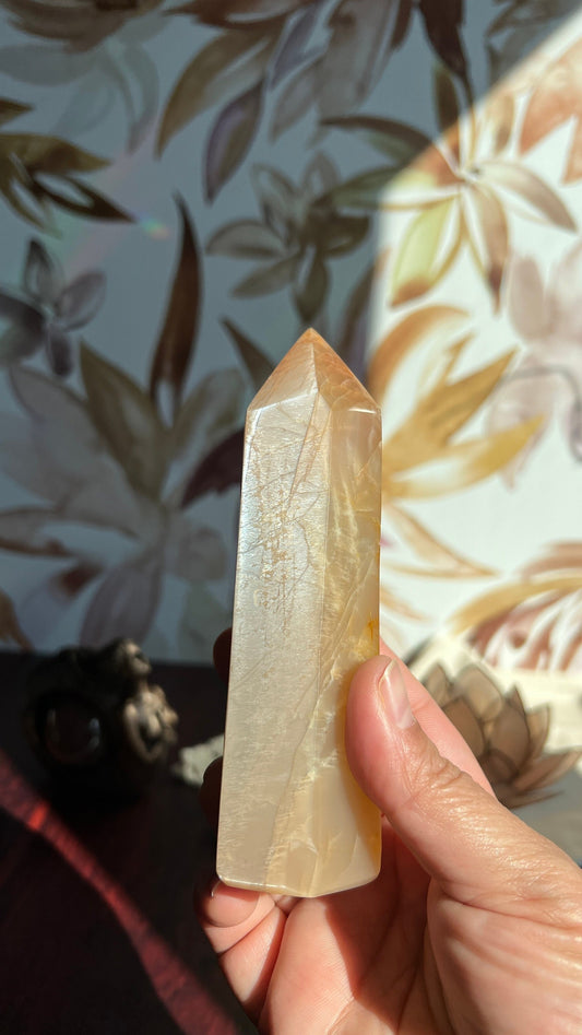 Stunning Peach Moonstone Tower is super flashy on two sides. It stands 5 1/2 inches tall and weighs 12. ounces (PMT-1)