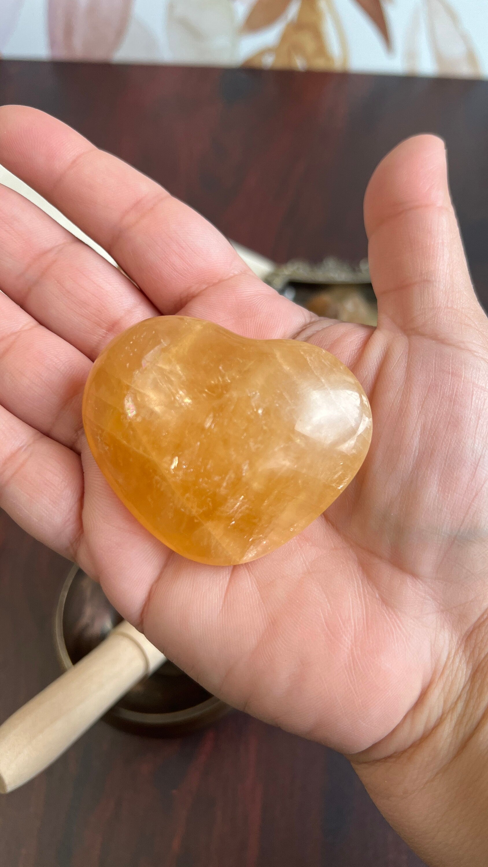 Beautiful Honey Calcite Heart Carving with rainbow inclusions 2 1/2 inches wide 3.5 ounces