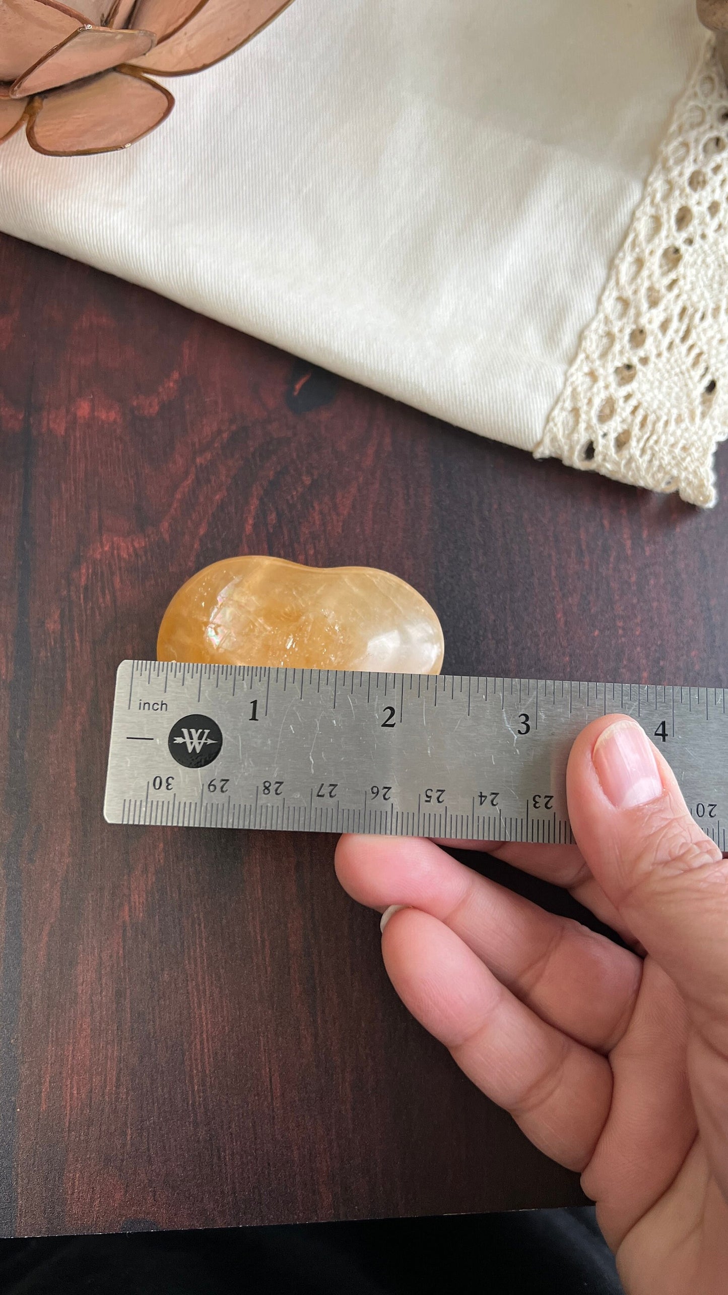 Beautiful Honey Calcite Heart Carving with rainbow inclusions 2 1/2 inches wide 3.5 ounces