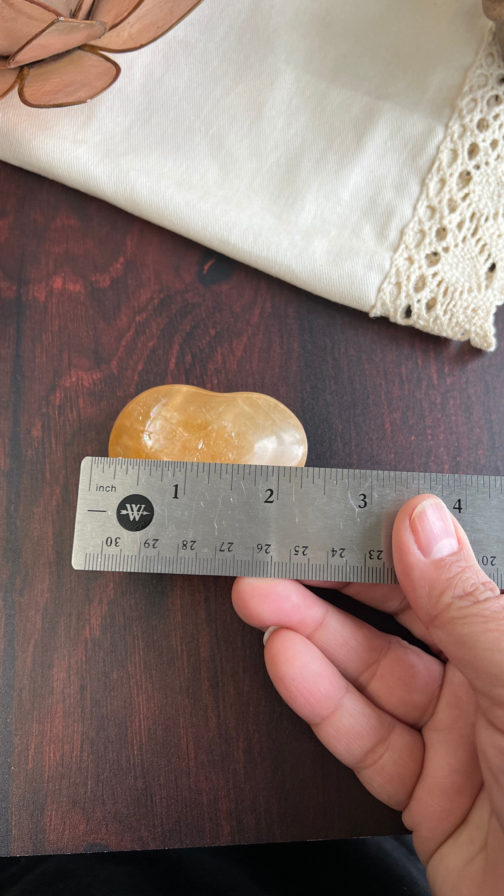 Beautiful Honey Calcite Heart Carving with rainbow inclusions 2 1/2 inches wide 3.5 ounces