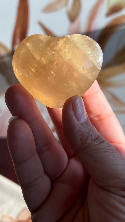 Beautiful Honey Calcite Heart Carving with rainbow inclusions 2 1/4 inches wide 2.8 ounces (HC-Heart2)