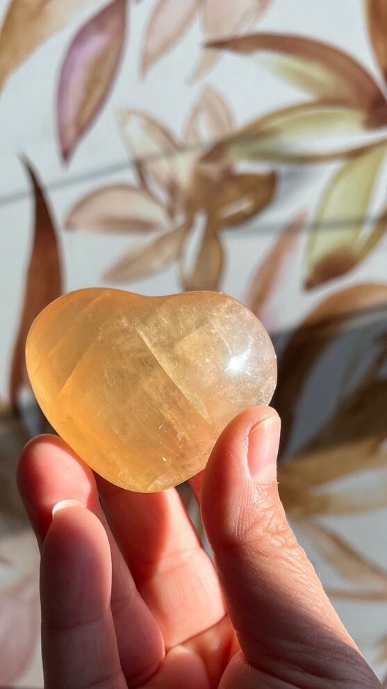 Beautiful Honey Calcite Heart Carving with rainbow inclusions 2 1/4 inches wide 2.8 ounces (HC-Heart2)