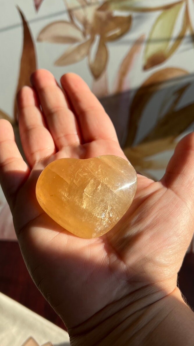Beautiful Honey Calcite Heart Carving with rainbow inclusions 2 1/4 inches wide 2.8 ounces (HC-Heart2)