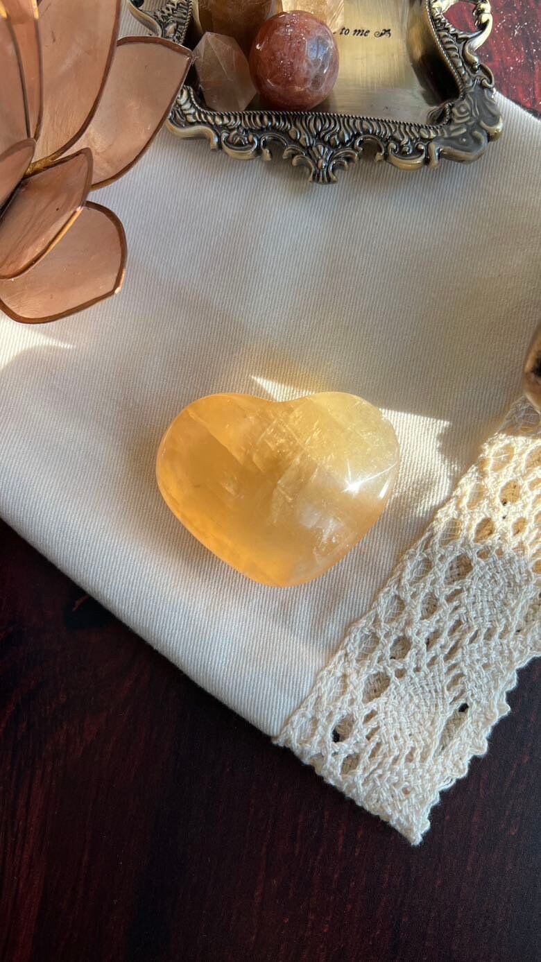Beautiful Honey Calcite Heart Carving with rainbow inclusions 2 1/4 inches wide 2.8 ounces (HC-Heart2)