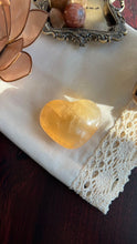 Load image into Gallery viewer, Beautiful Honey Calcite Heart Carving with rainbow inclusions 2 1/4 inches wide 2.8 ounces (HC-Heart2)
