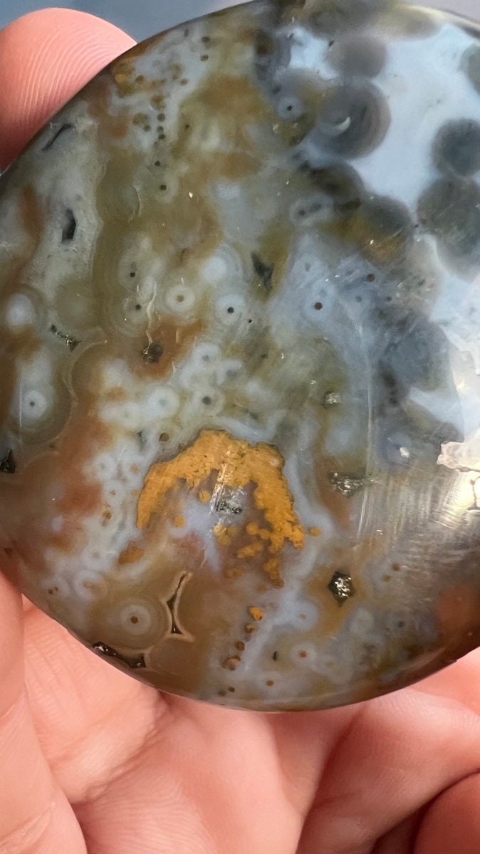 Incredible 8th Vein OJ (Ocean Jasper) Palm Stone with detailed fish eye orbs