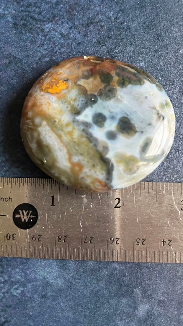 Incredible 8th Vein OJ (Ocean Jasper) Palm Stone with detailed fish eye orbs