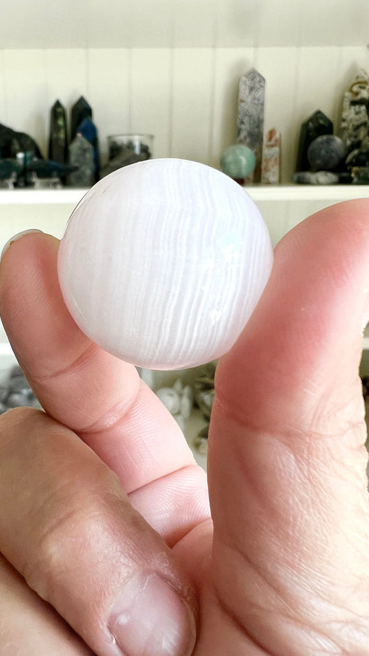 Pink Mangano Calcite Sphere 1 inch with Vibrant glow, UV Reactive Fluorescent