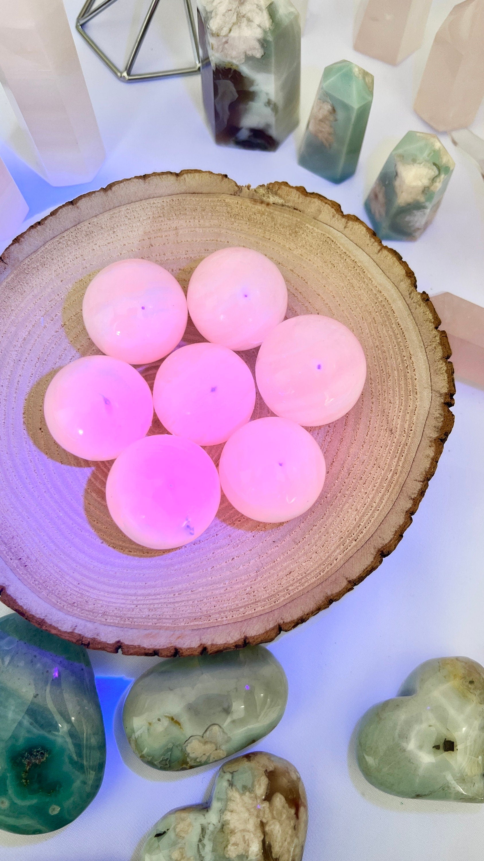 Pink Mangano Calcite Sphere 1 inch with Vibrant glow, UV Reactive Fluorescent