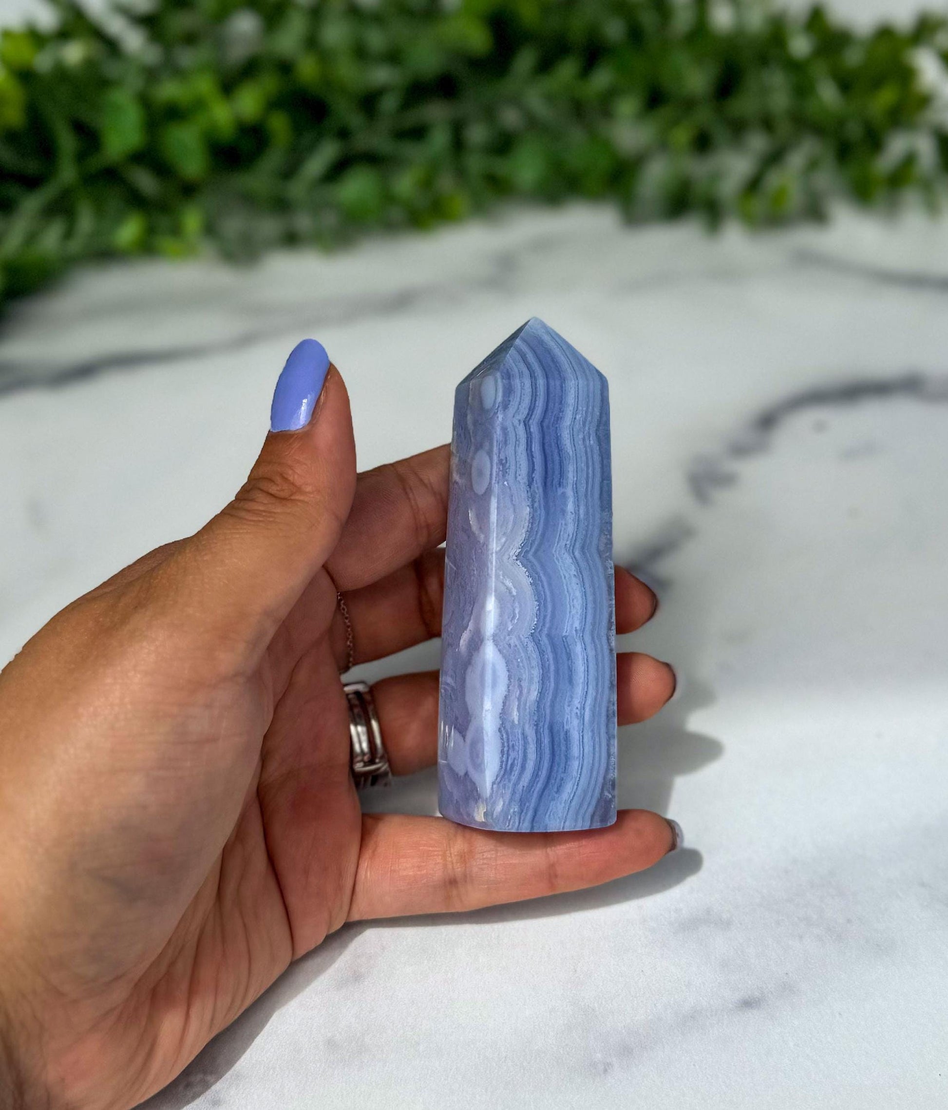 Blue Lace Agate Tower with gorgeous patterns that are both orbicular and lacey. A truly stunning and unique piece.