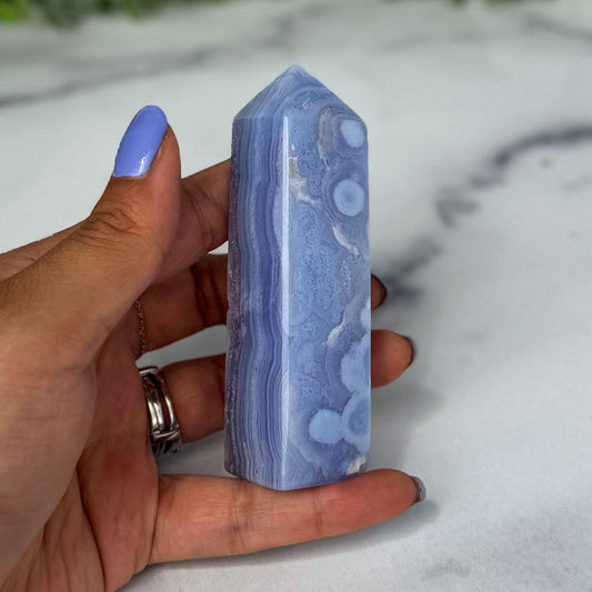 Blue Lace Agate Tower with gorgeous patterns that are both orbicular and lacey. A truly stunning and unique piece.