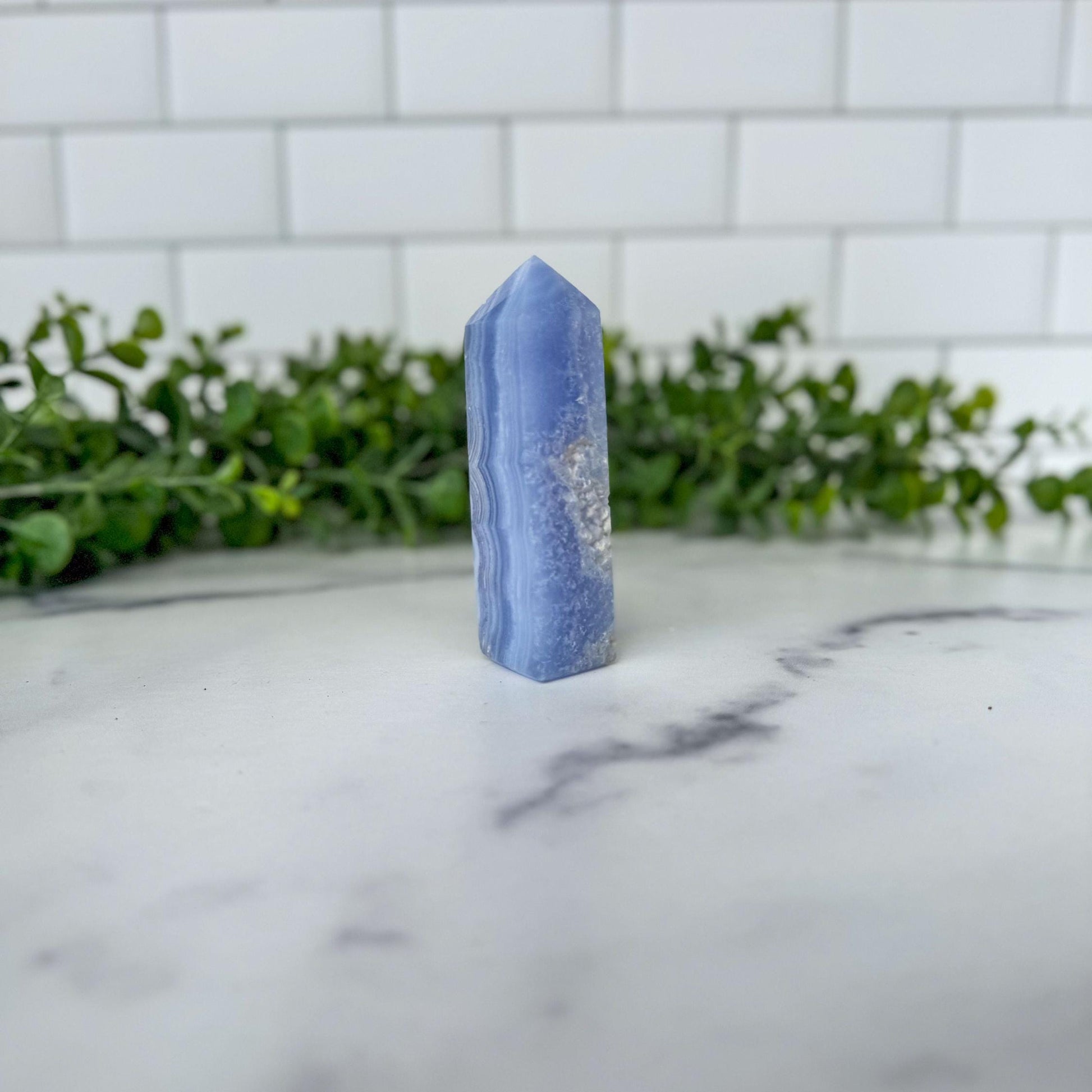 Blue Lace Agate Tower with gorgeous patterns that are both orbicular and lacey. A truly stunning and unique piece.