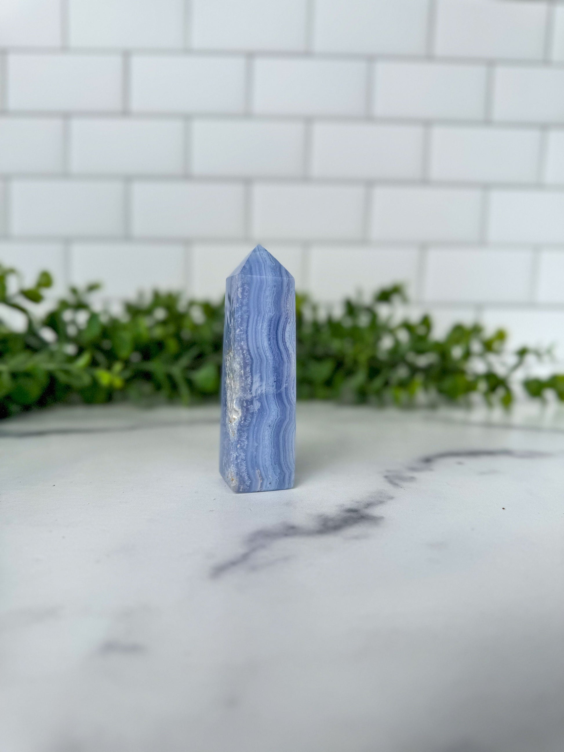 Blue Lace Agate Tower with gorgeous patterns that are both orbicular and lacey. A truly stunning and unique piece.