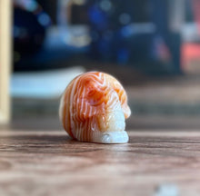 Load image into Gallery viewer, Carnelian Crystal Skull with Vibrant Banding | Banded Carnelian Agate Gemstone Skull | Unique Orange and White Halloween Decor (CarnSkull-1)
