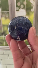 Load and play video in Gallery viewer, Stunning 2 inch Sodalite Sphere with deep royal blue color with a white calcite pattern, wooden stand included.
