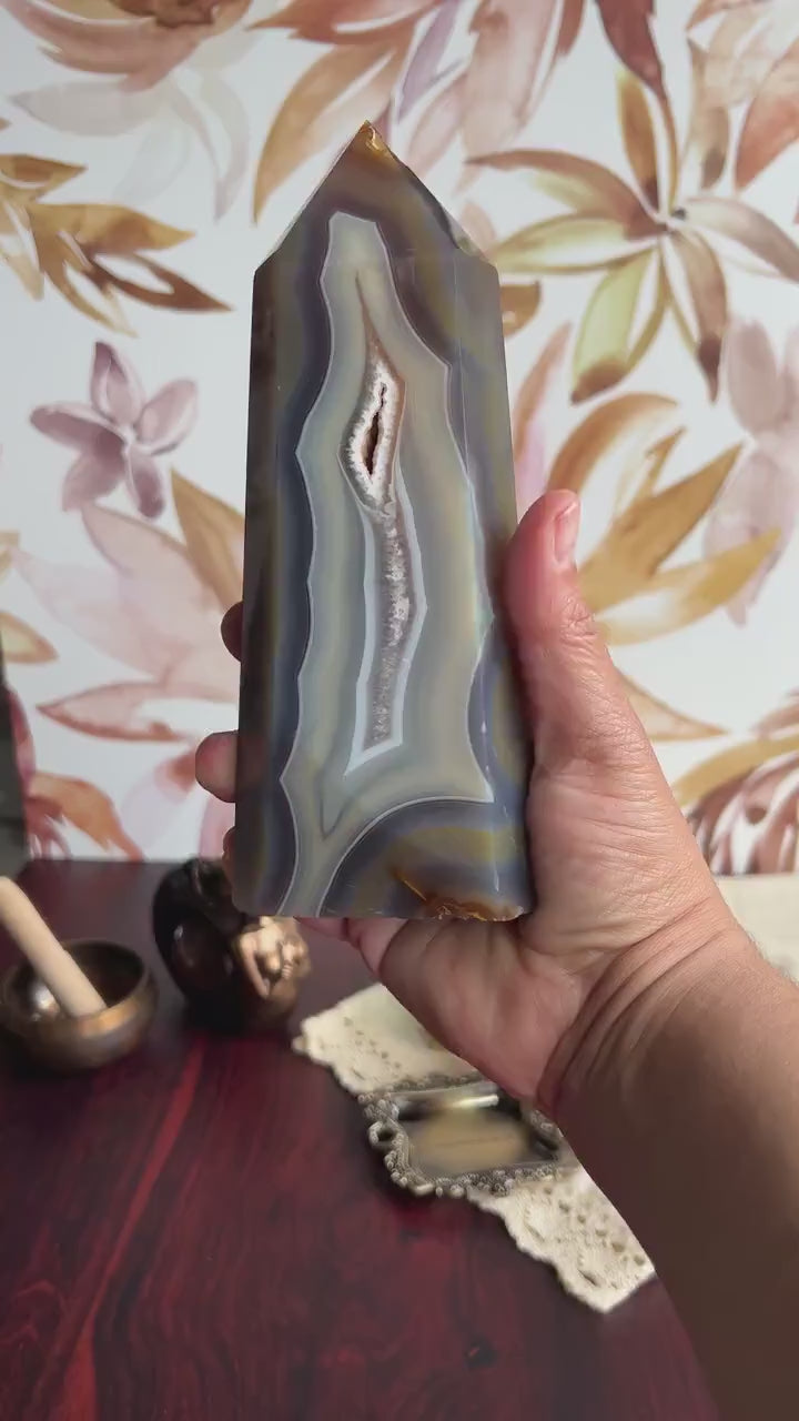 Gorgeous Agate Tower, with swirling colors throughout stands 7 1/2 inches and weighs 2.5 pounds  (AG-T-1)
